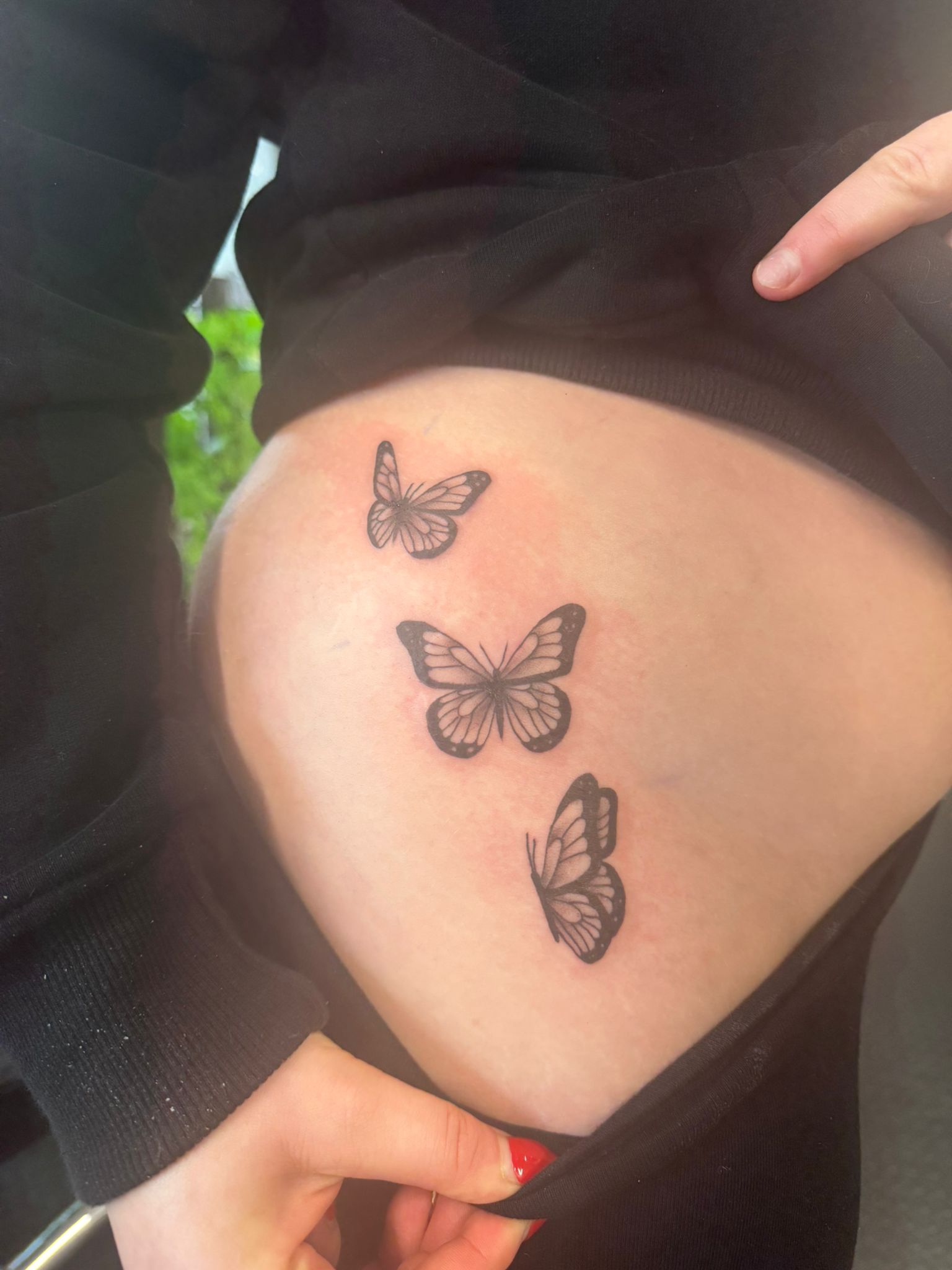 Fine line butterfly tattoo by Lost Soul Tattoo Studio